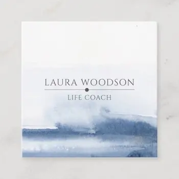 Business card for life coaches from Zazzle with a minimalist square design, featuring soft blue watercolor background and simple centered text with name and title.