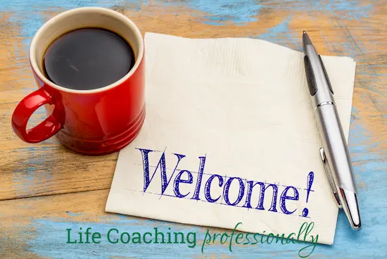 What to include in your welcome letter to new coaching clients Red coffee mug and welcome letter